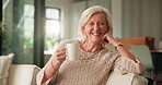 Face, smile and coffee with old woman on sofa for relax, comfortable and morning drink. Happiness, beverage and drinking tea with senior person and cup in living room of home for resting and calm