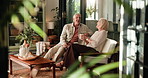 Laugh, drinking coffee and senior couple in home, talking or bonding in morning together. Elderly man, woman and tea in living room, funny story or communication with partner for joke in retirement