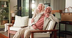Laugh, hug and senior couple in home, talking and bonding with partner for love. Funny, elderly man and woman and embrace in living room for story, humor and communication together in retirement