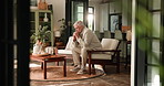Sad, elderly man and thinking in house with mental health reflection, memory loss and contemplation. Retirement, thoughtful and senior person with depression, grief and dementia in home living room.