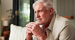 Elderly, man and thinking in home with reflection for memory, retirement or remember marriage. Comfortable, thoughtful or senior person in house with contemplation, daydream or nostalgia for partner.