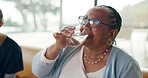 Old woman, drinking pills and nurse in home on sofa with tablet, checklist and schedule for medicine. Elderly person, caregiver and tech with wellness, vitamins and water for drugs in retirement