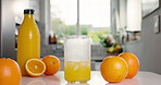 Fruit, orange juice and kitchen with drink, timelapse and organic citrus for diet in home. Health, nutrition and vitamin c with ingredients for detox, wellness and natural benefits with stop motion