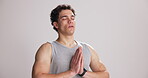 Man, namaste and meditation for yoga in studio for fitness, breathing exercise and holistic healing. Mockup space, person and inhale with prayer hands, inner peace and mindfulness on white background