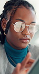 Business, laptop and black woman with tablet, glasses and submission with online reading. African person, eyewear and journalist with tech, editing and research for article, copywriting or reflection