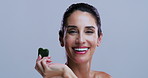 Gua sha, skincare and face of woman in studio for facial glow, lymphatic drainage and beauty. Massage, dermatology and portrait of person with jade stone for anti aging benefits on white background