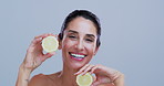 Happy woman, face and lemon in studio for skincare, glow and mockup space for results on background. Mature person, smile and pride with organic citrus fruit, beauty and vitamin c benefits in Spain