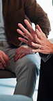 Hands, support group and woman talk for therapy meeting, mental health advice and share story. Psychology, speaking and people together for help, depression recovery and healing in community center