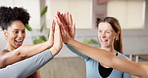 Friends, high five and pilates with women in class for fitness, motivation and community. Wellness, team building and applause with people in yoga studio for diversity, solidarity and health 