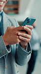 Hands, business and man with phone in office for research, social media and finance report. Male person, laughing and mobile for funny feedback, schedule update and review budget of investment email