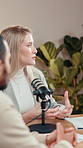 Group, business podcast and woman talk with microphone  for show, finance advice and interview. Broadcast, technology and influencer recording audio, content creation and investment tips in studio