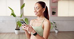 Happy woman, phone and texting on web at gym for fitness, contact and excited for notification at club. Person, smartphone and smile with chat, mobile app or social network post at wellness class
