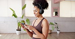 Happy, fitness and woman with cellphone, headphones and smile with wellness, podcast or song. Radio, exercise or healthy person with smartphone, audio or listening to music, workout or streaming app