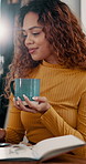Agenda, coffee and remote work with woman in home office for development, reading or research. Drink, notebook and small business with happy freelance employee in apartment for startup planning