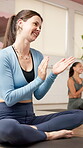 Fitness, yoga or women with applause in studio, yogi recognition or group commitment to complete class. Healthy exercise, laugh and people clap to finish session, community and gratitude for wellness