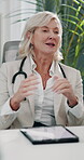 Doctor, meeting and advice with mature woman in clinic for consulting, treatment plan or medical appointment. Healthcare checkup, discussion and diagnosis feedback with people in office for patient