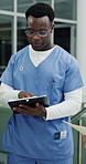 Man, doctor and hospital with clipboard at night for planning, medical report and emergency response. People, discussion and digital with surgery schedule, treatment feedback and healthcare checklist