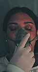Hands, woman and oxygen mask for ventilation on stretcher, medical response and emergency care. Above, unconscious patient and bed with respiratory support, hospital transfer and trauma crisis in icu