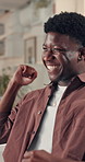 Black man, fist pump and happy at startup, office and smile for success, promotion or salary increase. African person, excited and happy with celebration, achievement and goals at creative agency