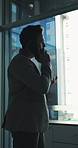 Window, business and man in office, phone call and networking for investment deal. View, investor and person with smartphone, communication and planning for trading proposal, talking and connection
