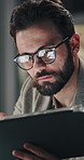 Night, reading or man with tablet in office for data analysis, budget report or plan for investment. Reflection, late or finance analyst with tech to review stats, research profit opportunity or risk