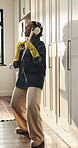 Headphones, dancing and black woman with broom in home, floor maintenance and listening to music. Spring cleaning, audio tech and housekeeper singing with air guitar, radio or remove dirt for hygiene