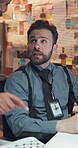 Computer, conversation and photograph with detective team in office for evidence review. Collaboration, investigation and pointing with people in police station for law enforcement or legal justice