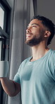 Man, coffee and thinking by window in bedroom with reflection, curtains and happy memory in home. Person, smile and perspective with drink, beverage or wake up in morning with inspiration at house