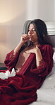 Cough, sick and tissues with woman in bedroom of home for recovery from cold or flu virus. Allergy, breathing and chest infection with Indian person on bed in apartment for asthma or sinus symptoms