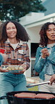 Talking, friends and group with bbq, backyard and bonding on social gathering, meal prep and holiday. Happy, people or discussion on event, hangout and reunion with alcohol, laughing and barbecue