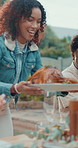 Applause, excited and roast chicken with people in backyard of home together for lunch gathering. Celebration, food and party with group of friends clapping outdoor for social event or reunion