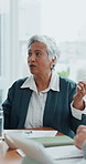 Team, business woman and paperwork in meeting for finance reporting, forecasting or explain trends. Financial manager, people and discussion with chart documents in office for market data or feedback
