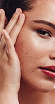Skincare, face or woman in studio with fingers, facial glow or stretching in cosmetology. Closeup, hydration and girl on white background with confidence, firmness or smooth skin in beauty results.