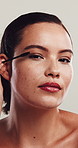 Makeup, face and mascara with woman in studio for beauty, eyelash extension and glow aesthetic. Dermatology, makeover and cosmetics wand with portrait of person on white background for shine