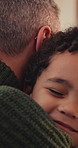 Happy, comfort and father hugging child in home for support, love and bonding together on weekend. Smile, connection and dad embracing boy kid for family time with care in living room at apartment.
