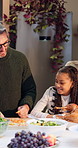 Happy, food and family at dinner in home for celebration, bonding or connection together. Smile, people and children with parents and grandparents for dishing meal at supper in dining room at house.
