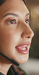 Speaking, customer service or woman with headset in call center, online communication or night help desk. Talking, troubleshooting or virtual assistant with tech support, bokeh and late client advice