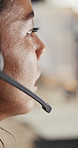 Call centre, closeup or woman in office with headset, contact us or communication in customer service. Blur, telecom or agent in agency with tech, virtual consulting or support in client assistance.