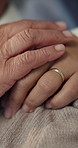 Holding hands, nurse and senior person with support, care and kindness with empathy closeup. Trust, elderly patient and comfort with caregiver, understanding and healthcare in retirement home