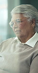 Sad, senior woman and thinking at house with depression, memory loss and retirement loneliness. Thoughts, elderly person and alzheimer with nostalgia, emotional isolation and grief for mental health