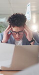 Office, paperwork and man with laptop, headache and overwhelmed with financial crisis or frustrated. Investment banker, stress and person with tech for balance sheet on website, pressure and burnout