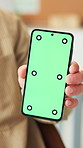 Hand, phone and green screen at office, display ux and mockup space for marketing at design agency. Person, mobile app developer and smartphone with ui, show and blank for advertising at company