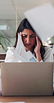 Falling paper, laptop and stress with woman at desk in office for finance fail or mistake. Computer, documents and headache with Indian employee in financial workplace for debt, error or loss