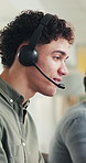 Customer service, headset and support with man in call center for assistance, contact us or virtual help. Communication, conversation and feedback with person in coworking office for consulting