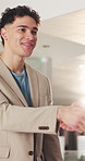 Handshake, smile and man with feedback in office for online project, business research or discussion. Shaking hands, meeting and night with digital tech for website review, collaboration or planning