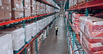 Above, supply chain and man in warehouse, inspection and organize inventory with storage maintenance. Person, logistics and employee with safety, distribution or export with backlog and manufacturing