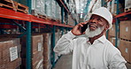 Black man, phone call and happy at warehouse for logistics, inspection and supply chain management. Mature African person, smartphone and smile with discussion, shelf and inventory at storage plant