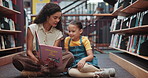Kid, teacher or reading a book in library with language assessment, study support or literature lesson. Learning, girl student and tutor with fiction novel on floor for exam preparation or assistance