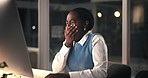 Black woman, tired and yawn with computer at night, office and exhausted with project at media company. African person, burnout and fatigue with pc, brain fog or dark workplace at creative agency