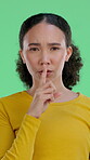 Hush, secret and face of woman on green screen for announcement, privacy and silence. Gossip, private information and rumor with portrait of person on studio background for emoji, mute and news